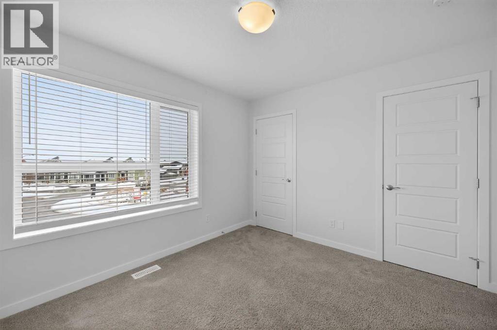 Single Family House for Sale in  Belmont Drive SW Belmont Calgary 