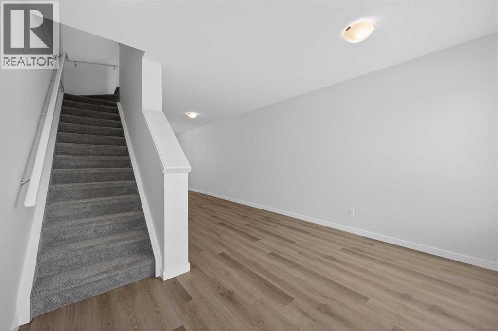 Single Family House for Sale in  Belmont Drive SW Belmont Calgary 