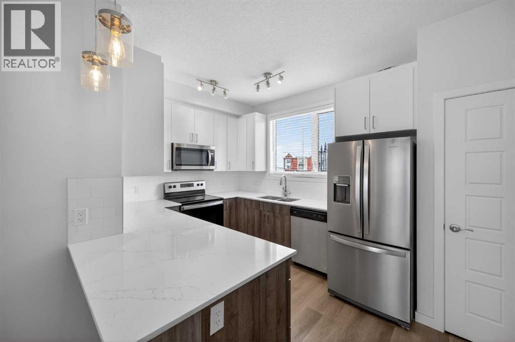 Single Family House for Sale in  Belmont Drive SW Belmont Calgary 