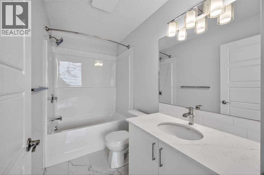 Single Family House for Sale in  Belmont Drive SW Belmont Calgary 