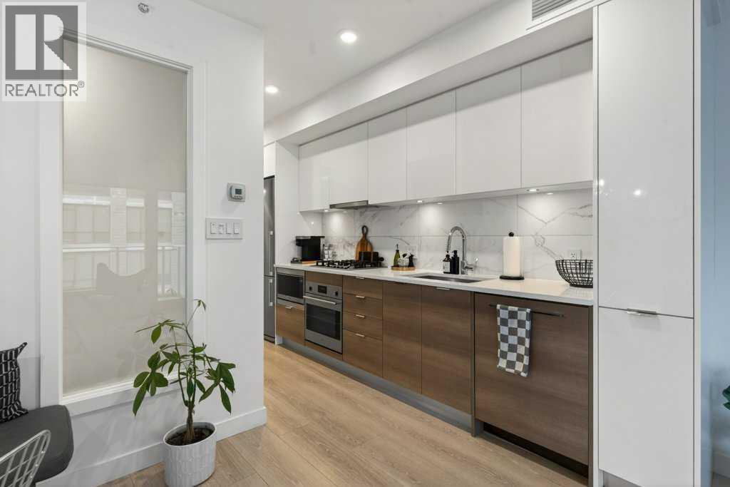 Single Family House for Sale in   Waterfront Court SW Chinatown Calgary 