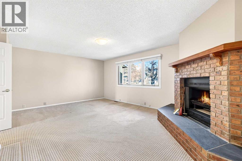 Single Family House 4 Level for Sale in  Glamis Terrace SW Glamorgan Calgary 