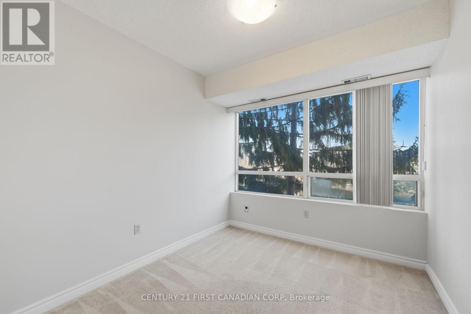 #306 744 WONDERLAND ROAD S - 22