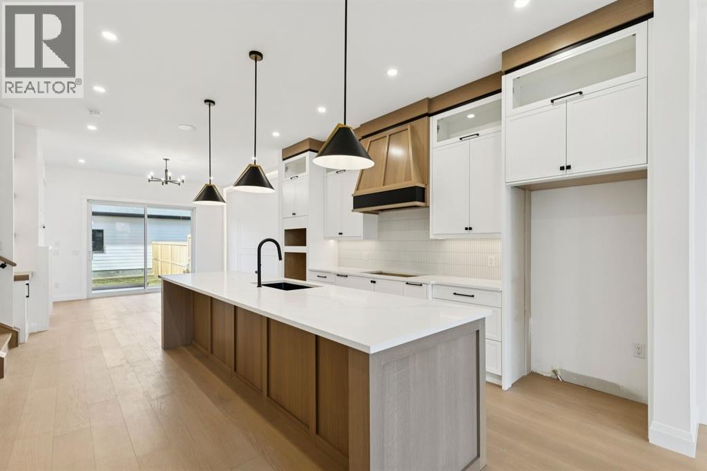 Single Family House for Sale in   Street Parkdale Calgary 