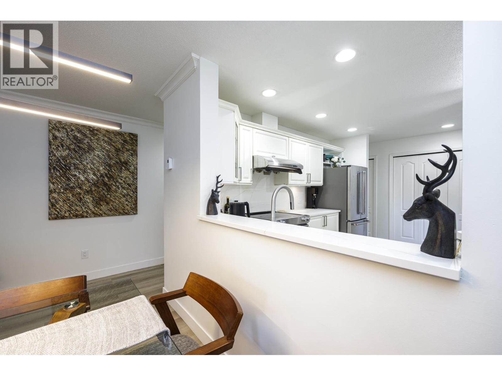 303 1500 OSTLER COURT, North Vancouver