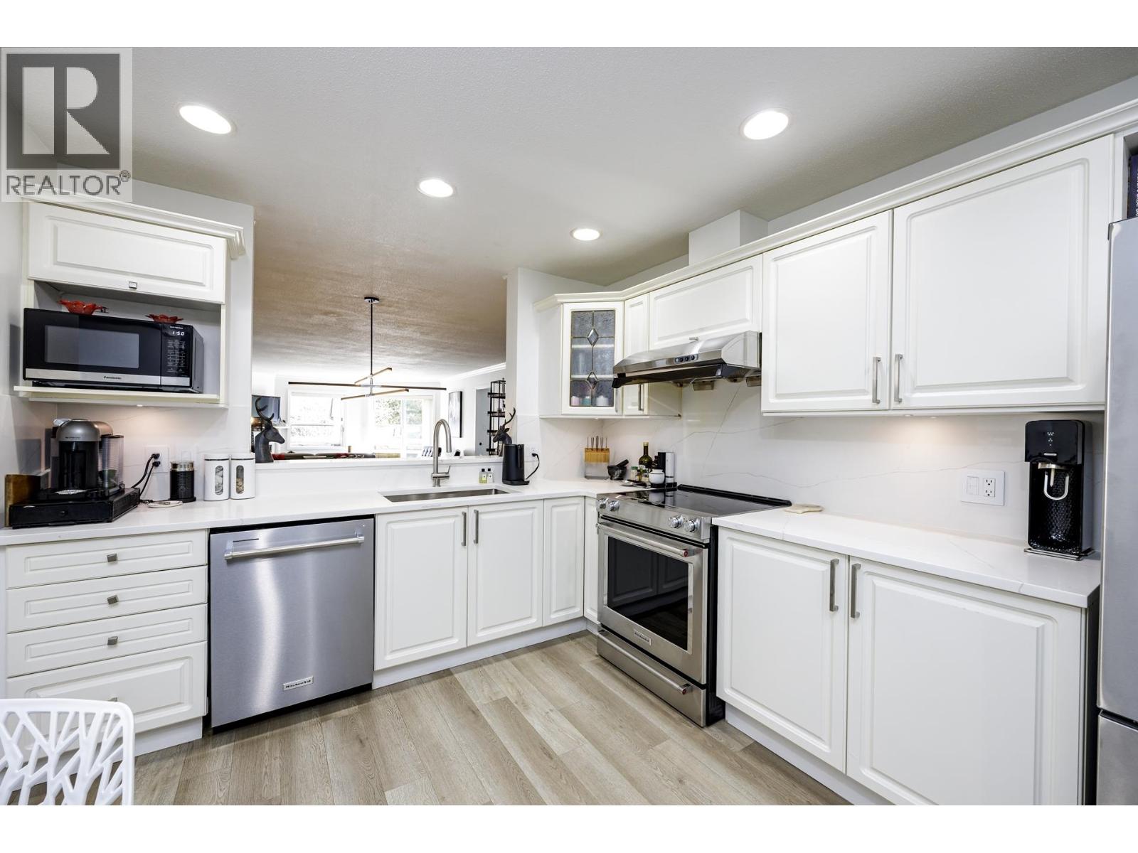 303 1500 OSTLER COURT, North Vancouver
