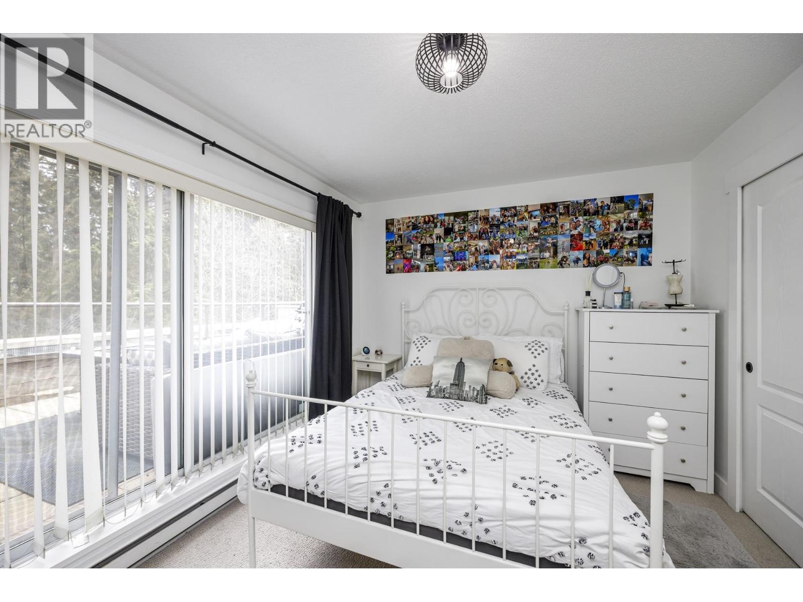 303 1500 OSTLER COURT, North Vancouver