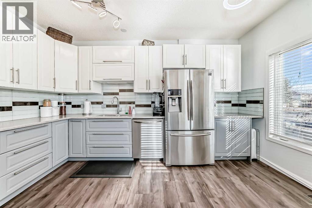 Single Family House 4 Level for Sale in  Sunlake Gardens SE Sundance Calgary 