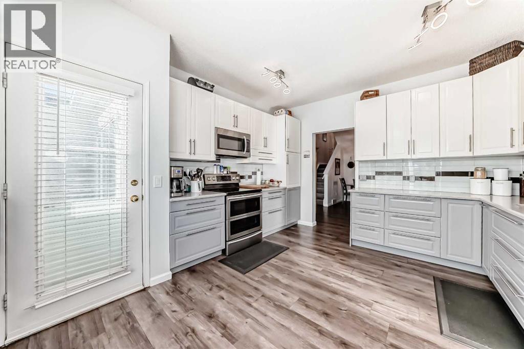 Single Family House 4 Level for Sale in  Sunlake Gardens SE Sundance Calgary 