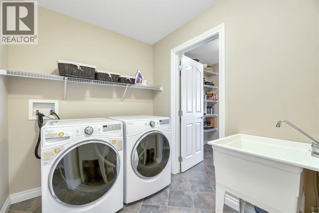 Single Family House for Sale in  Everhollow Crescent SW Evergreen Calgary 