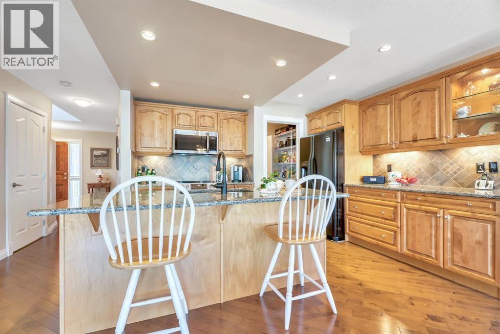 Single Family House for Sale in  Everhollow Crescent SW Evergreen Calgary 