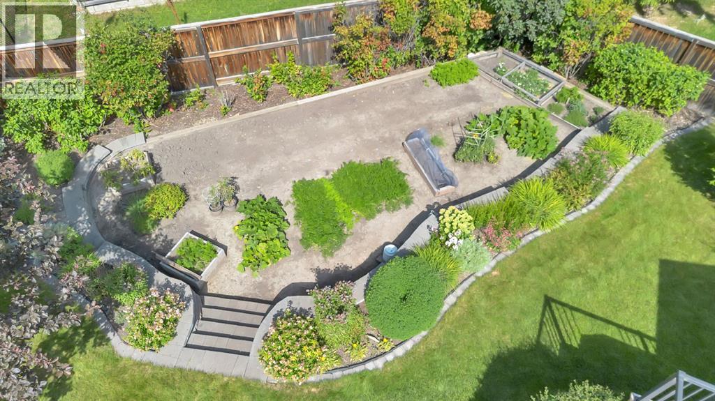 Single Family House for Sale in  Everhollow Crescent SW Evergreen Calgary 