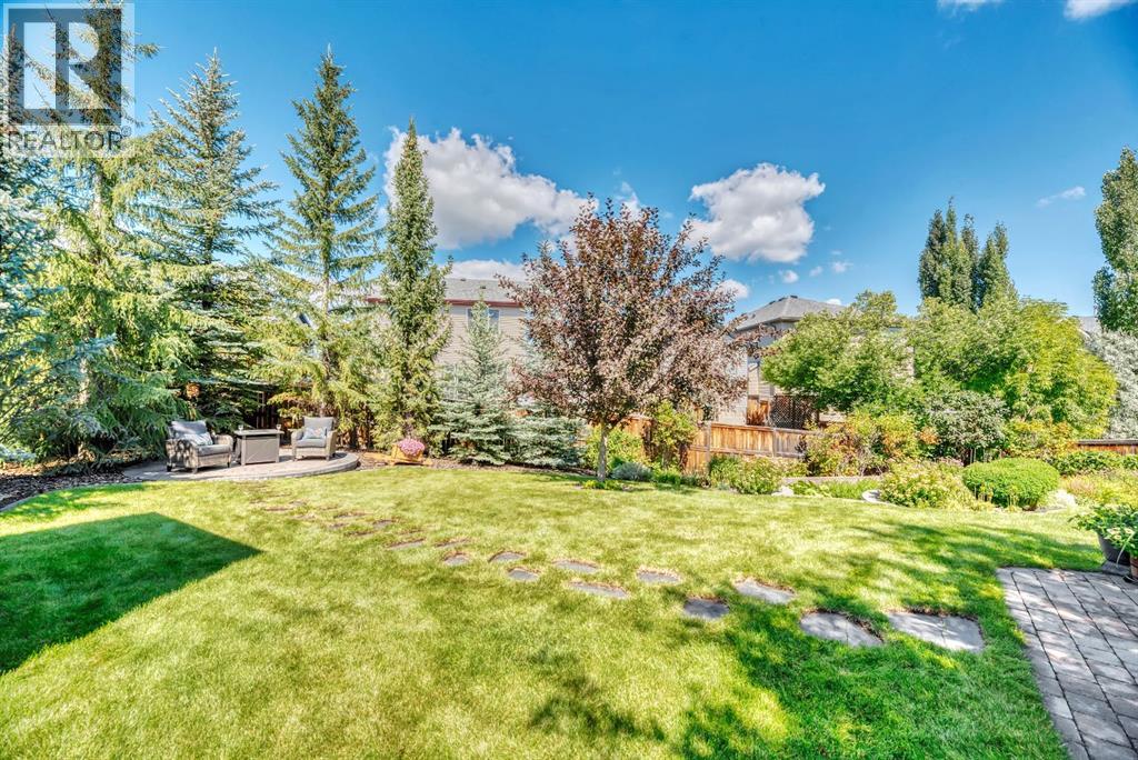 Single Family House for Sale in  Everhollow Crescent SW Evergreen Calgary 
