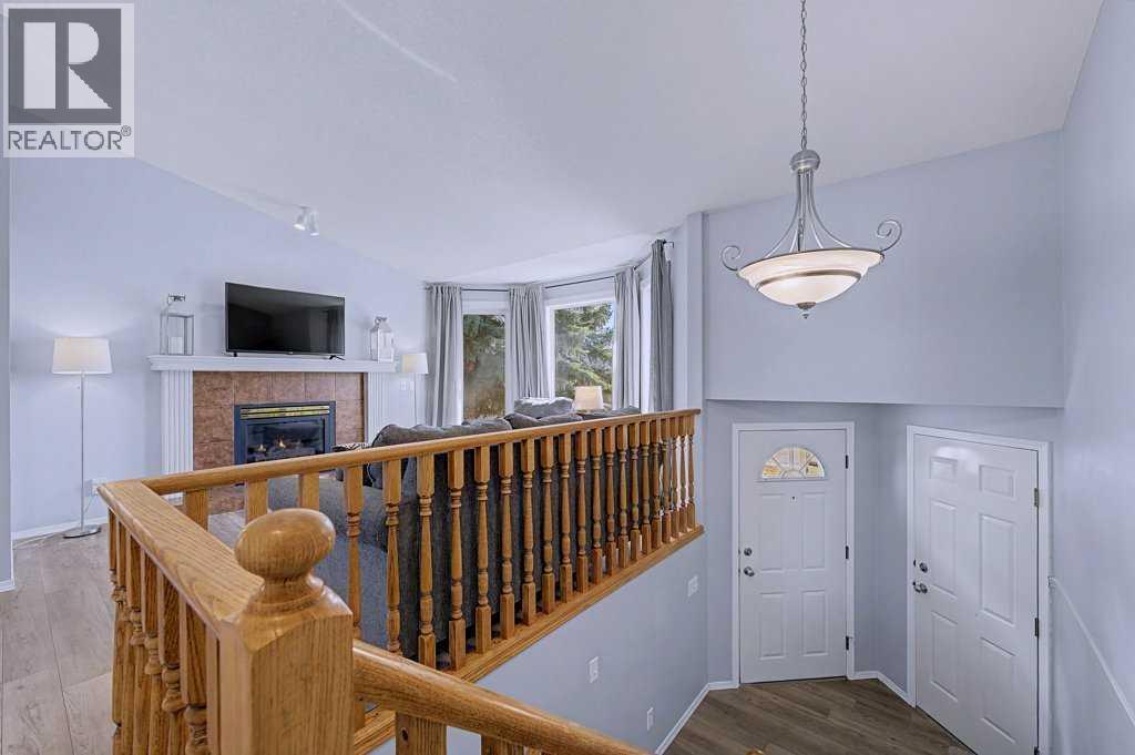 Single Family House Bi-level for Sale in  Sunlake Circle SE Sundance Calgary 