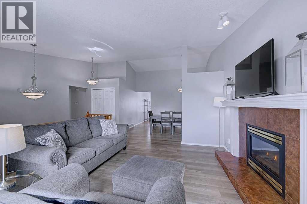 Single Family House Bi-level for Sale in  Sunlake Circle SE Sundance Calgary 