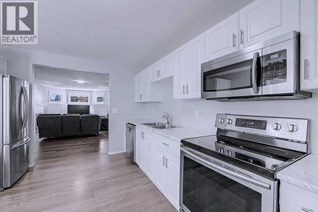 Single Family House Bi-level for Sale in  Sunlake Circle SE Sundance Calgary 