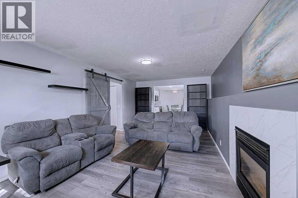 Single Family House Bi-level for Sale in  Sunlake Circle SE Sundance Calgary 
