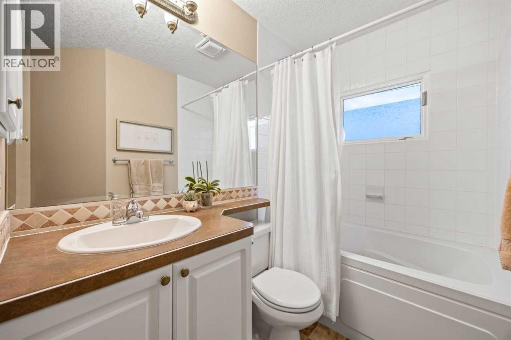 Single Family House Bungalow for Sale in  Wilshire Place SW Wildwood Calgary 