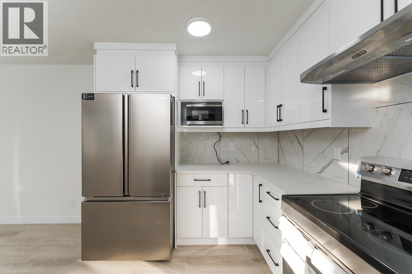 7790 QUEENS CRESCENT - 9