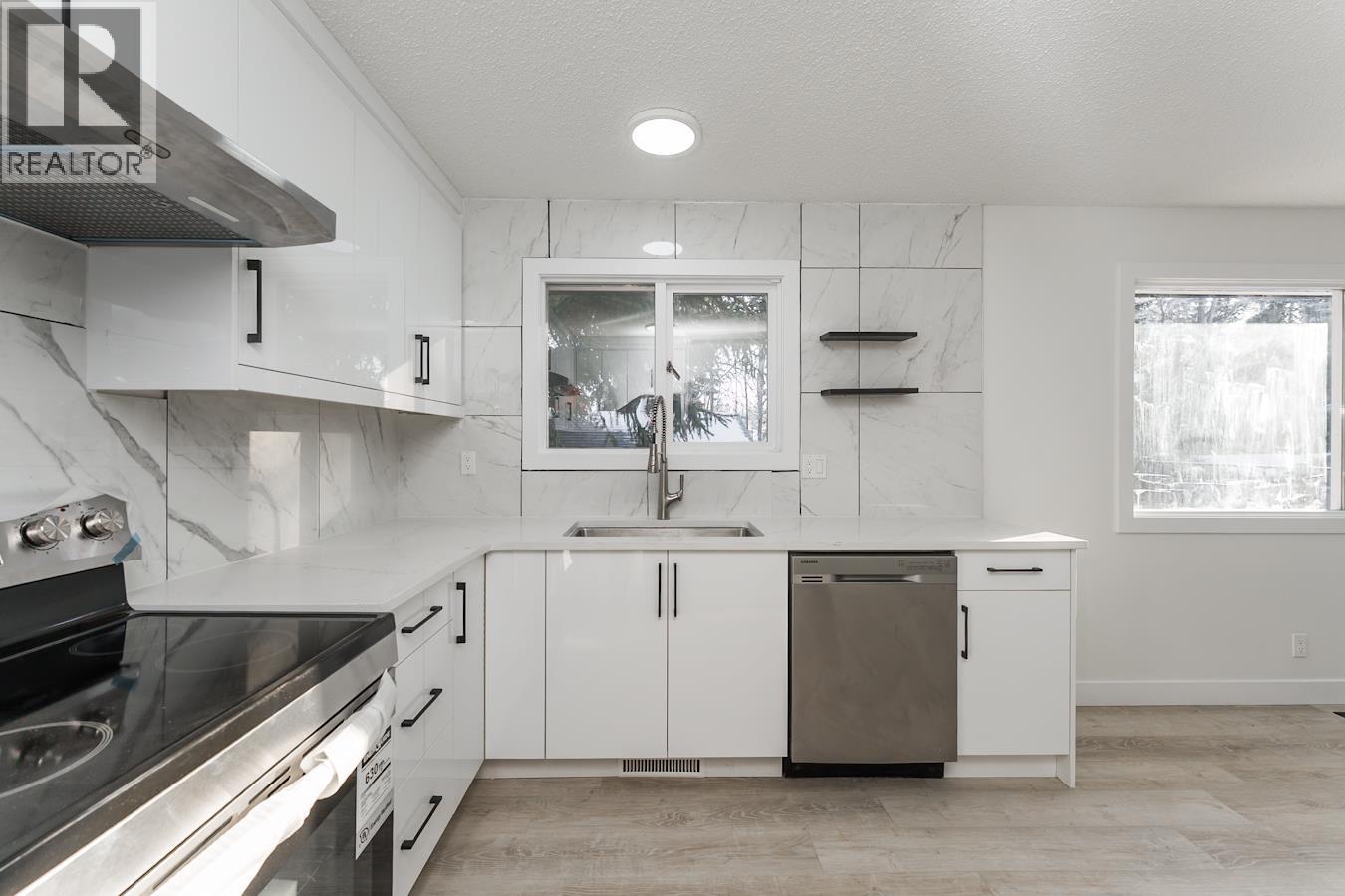 7790 QUEENS CRESCENT - 7