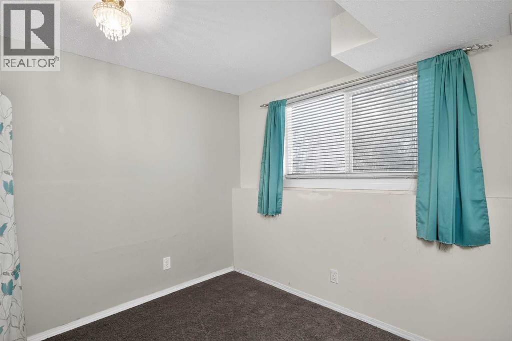 Single Family House Bi-level for Sale in A  Street SE Forest Lawn Calgary 