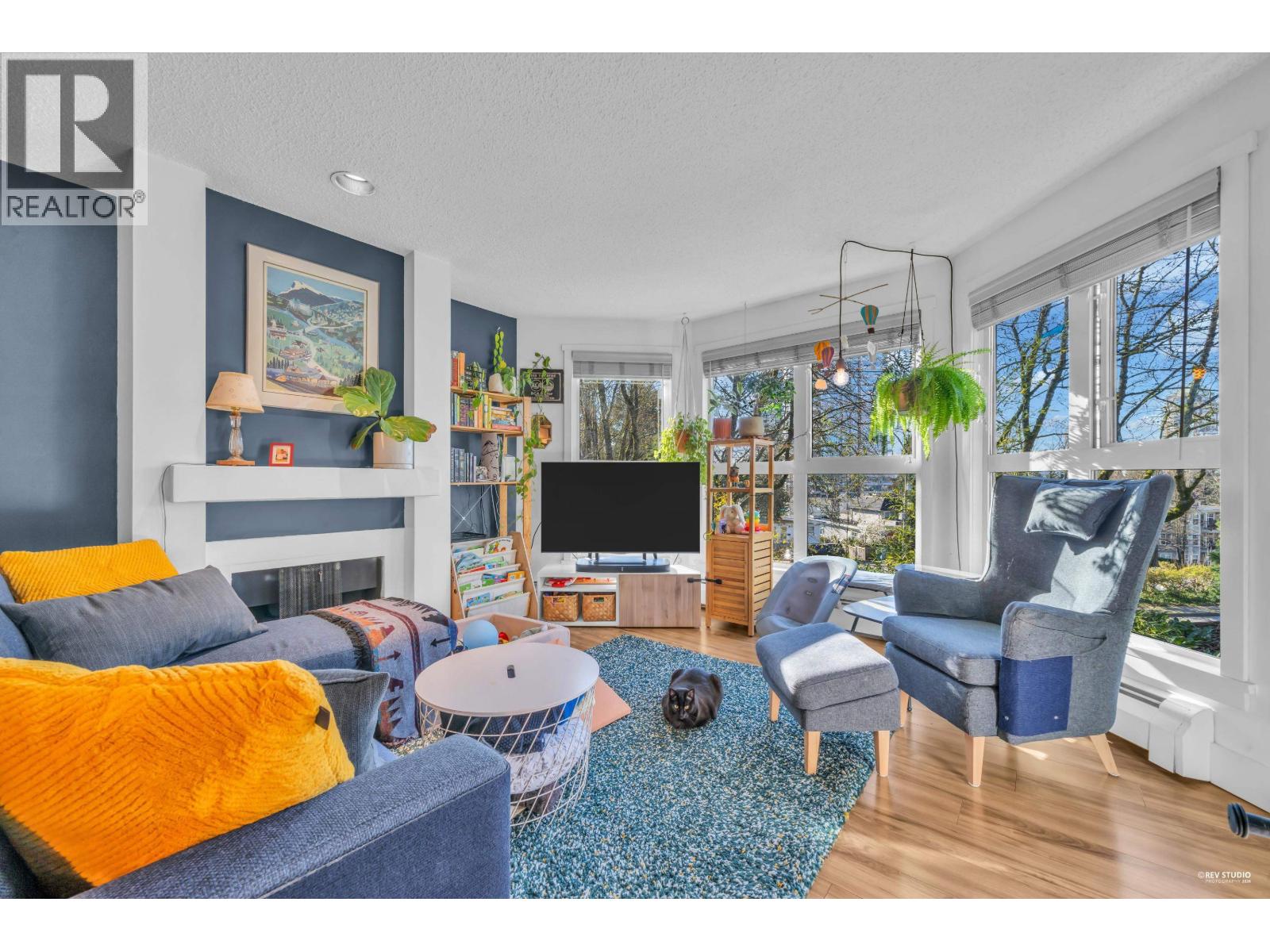 210 7055 WILMA Street - main photo