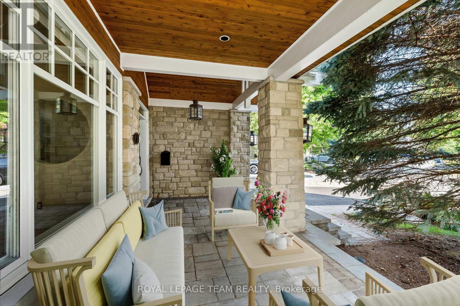 This front porch has been virtually staged