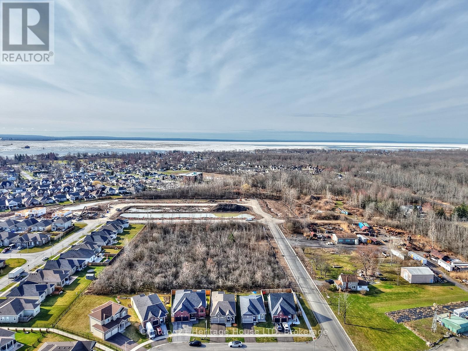 Aerial view of the property & neighbourhood