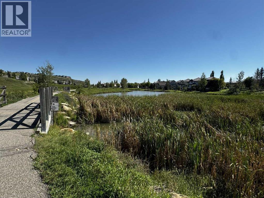 Single Family House 3 Level for Sale in  Hidden Creek Cove NW Hidden Valley Calgary 