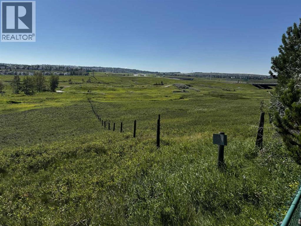 Single Family House 3 Level for Sale in  Hidden Creek Cove NW Hidden Valley Calgary 