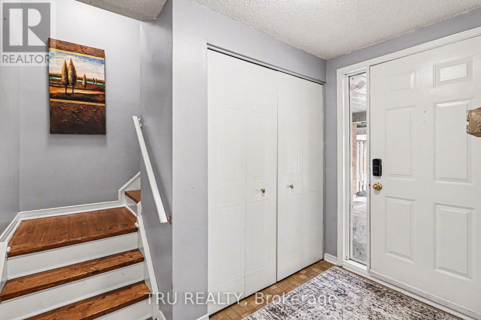 Entrance leading to main floor, storage, bathroom