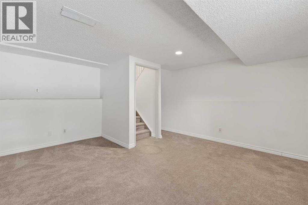 Single Family House 4 Level for Sale in  Canterbury Gardens SW Canyon Meadows Calgary 