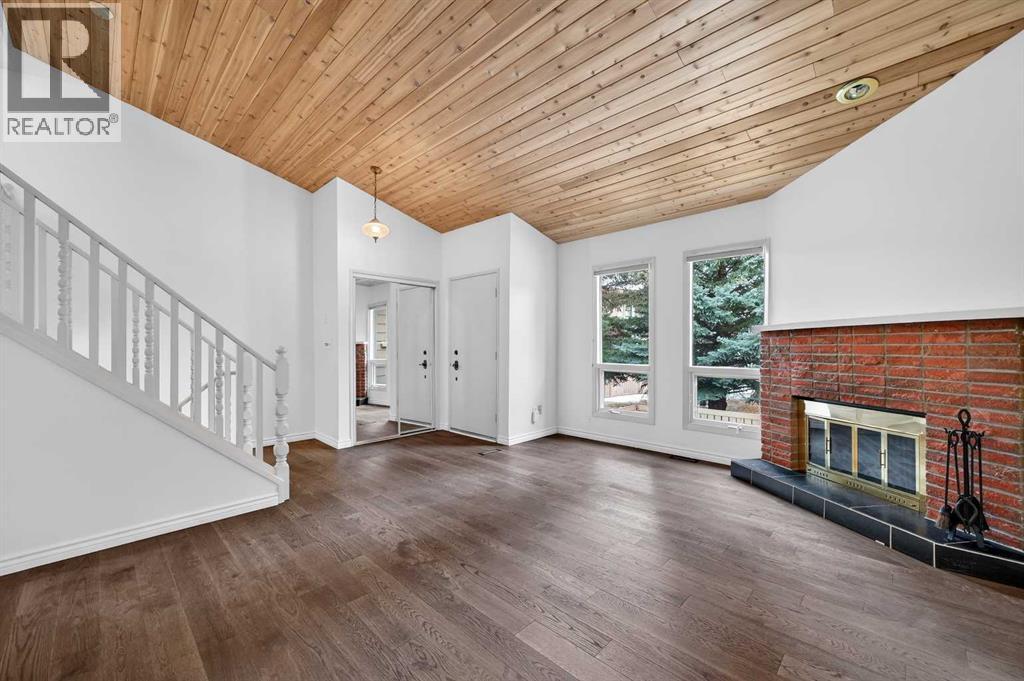 Single Family House 4 Level for Sale in  Canterbury Gardens SW Canyon Meadows Calgary 