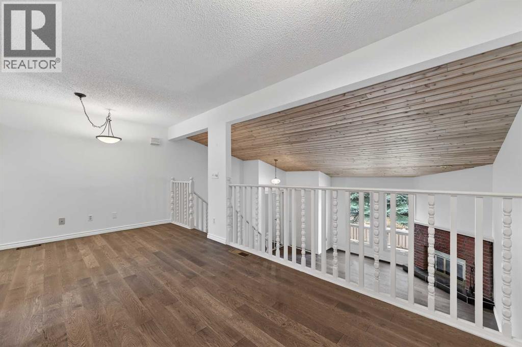 Single Family House 4 Level for Sale in  Canterbury Gardens SW Canyon Meadows Calgary 