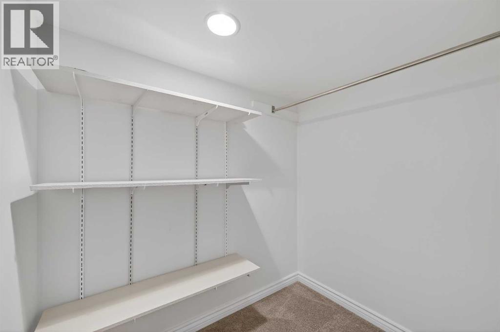 Single Family House 4 Level for Sale in  Canterbury Gardens SW Canyon Meadows Calgary 