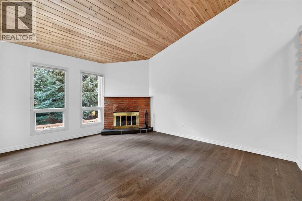 Single Family House 4 Level for Sale in  Canterbury Gardens SW Canyon Meadows Calgary 