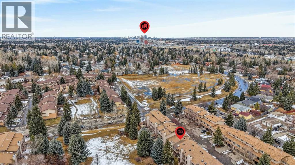 Single Family House 4 Level for Sale in  Canterbury Gardens SW Canyon Meadows Calgary 