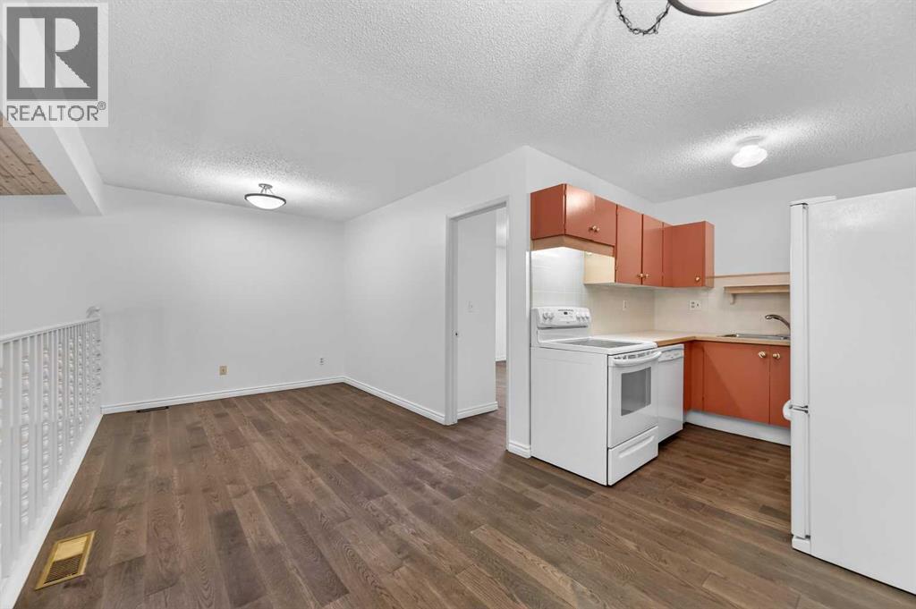 Single Family House 4 Level for Sale in  Canterbury Gardens SW Canyon Meadows Calgary 