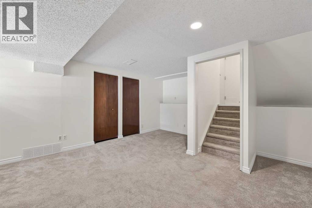 Single Family House 4 Level for Sale in  Canterbury Gardens SW Canyon Meadows Calgary 