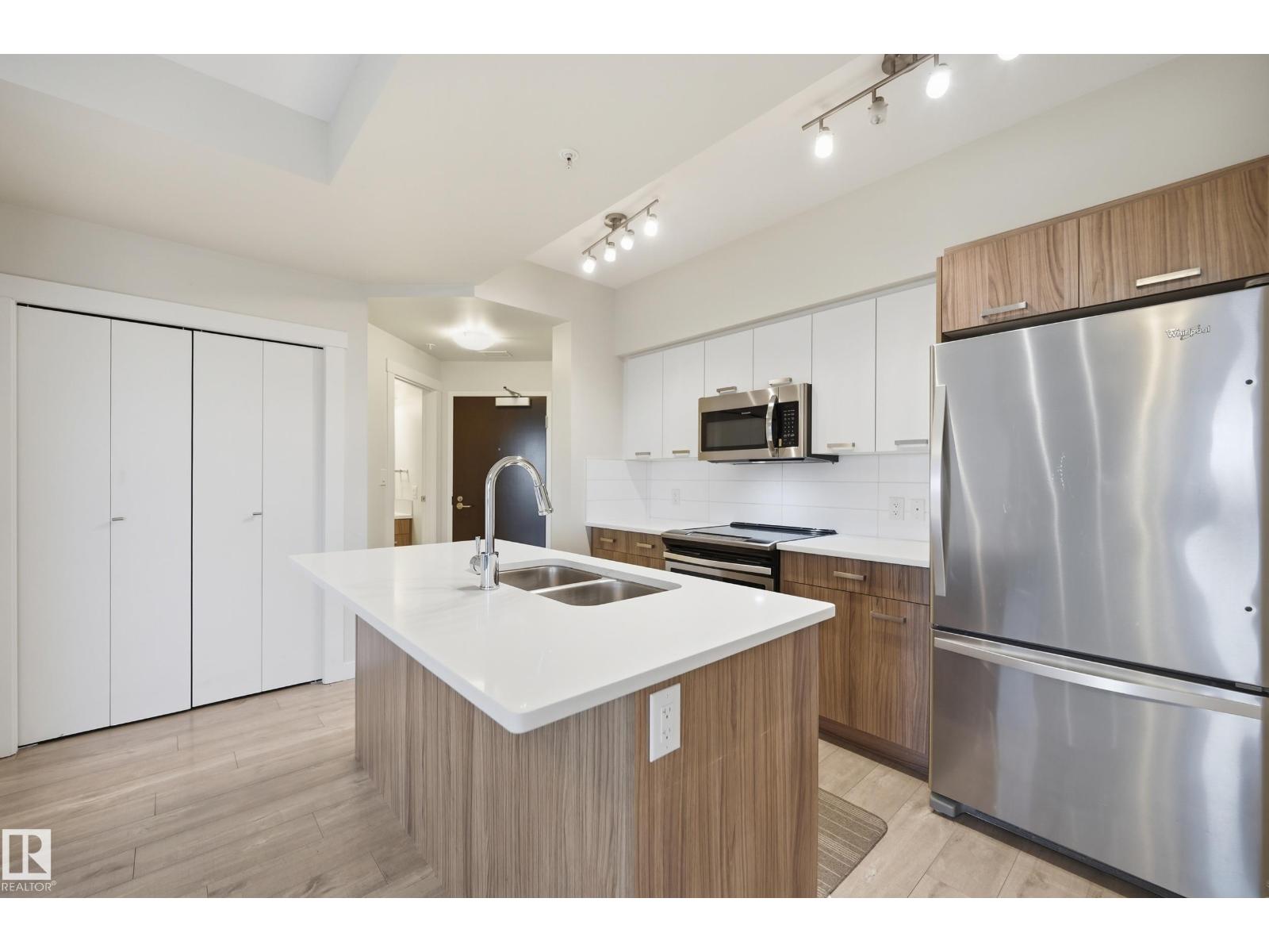 #706 10410 102 AV NW - 5