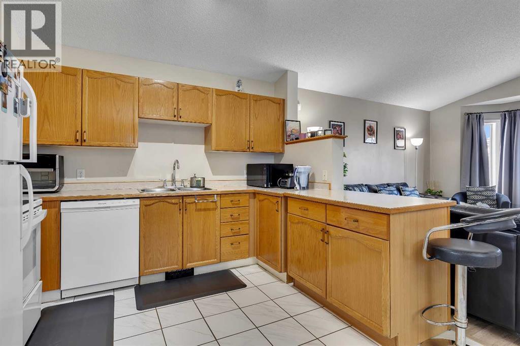 Single Family House 4 Level for Sale in  Martin Crossing Way NE Martindale Calgary 