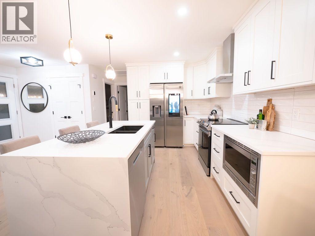 Single Family House Bungalow for Sale in  Lake Sylvan Drive SE Bonavista Downs Calgary 