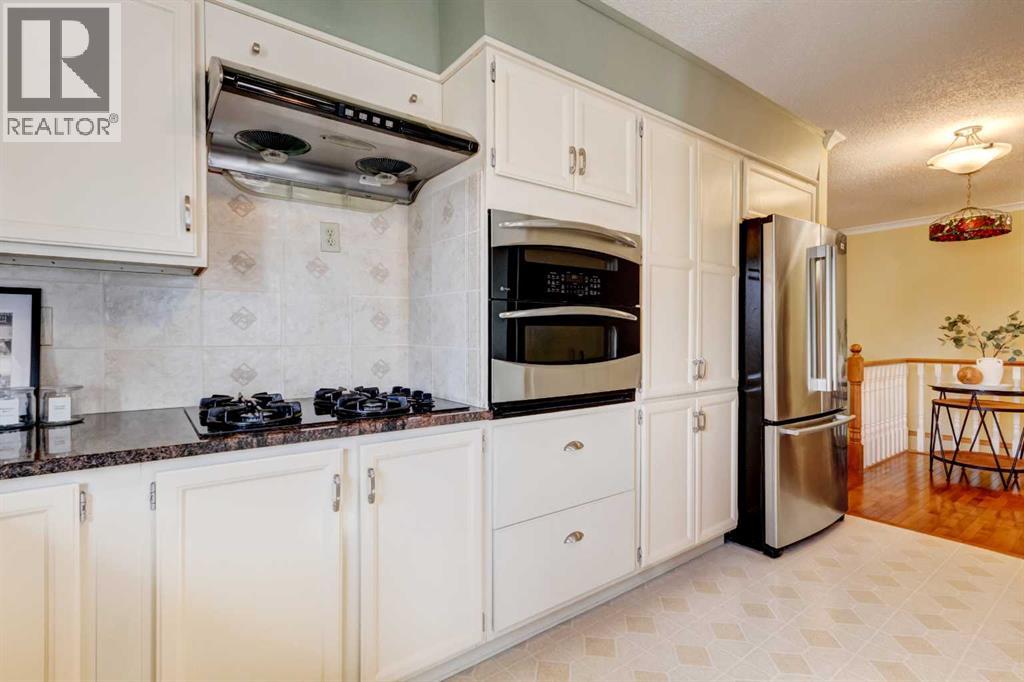 Single Family House for Sale in  Vandoos Villas NW Varsity Calgary 