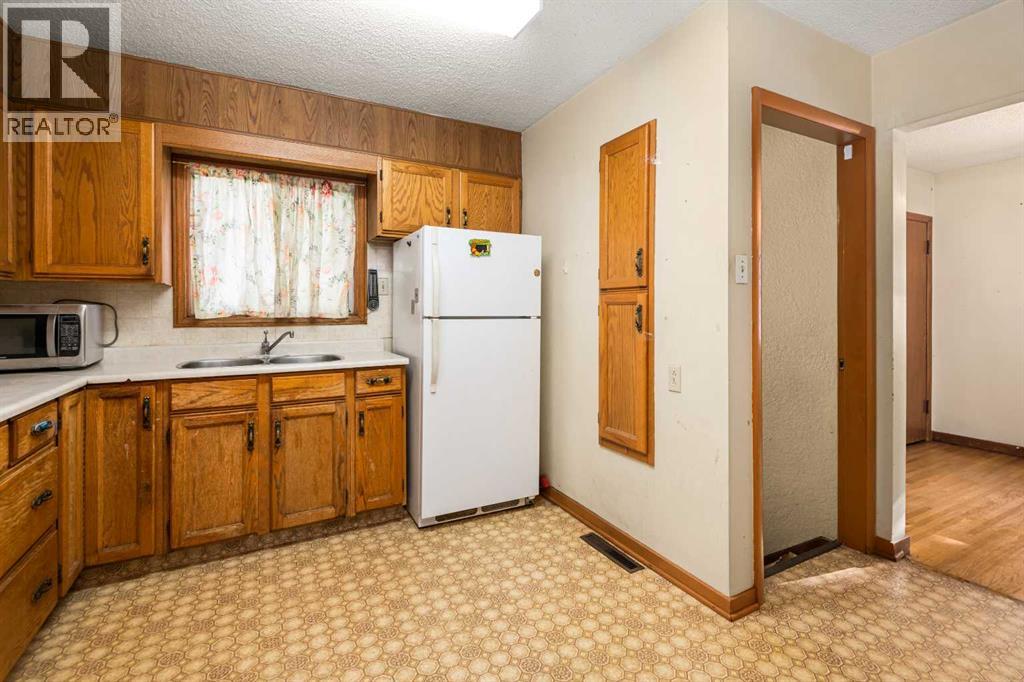 Single Family House Bungalow for Sale in   Street NW Banff Trail Calgary 