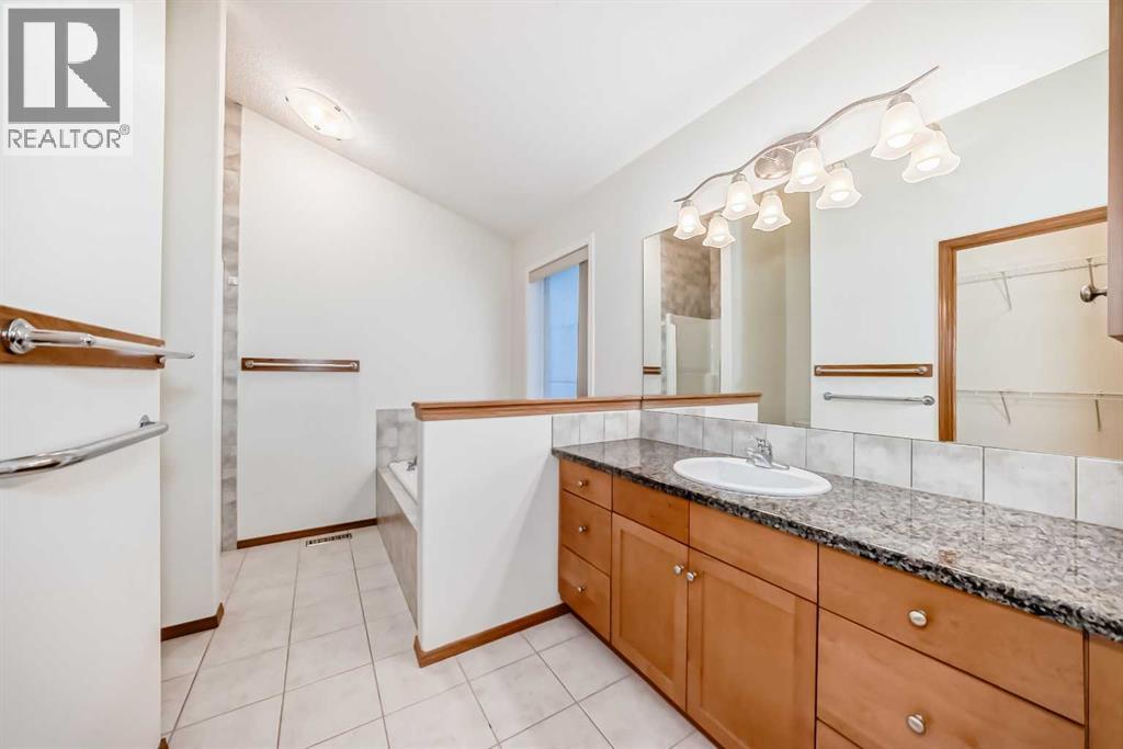 Single Family House Bungalow for Sale in  Cougartown Close SW Cougar Ridge Calgary 