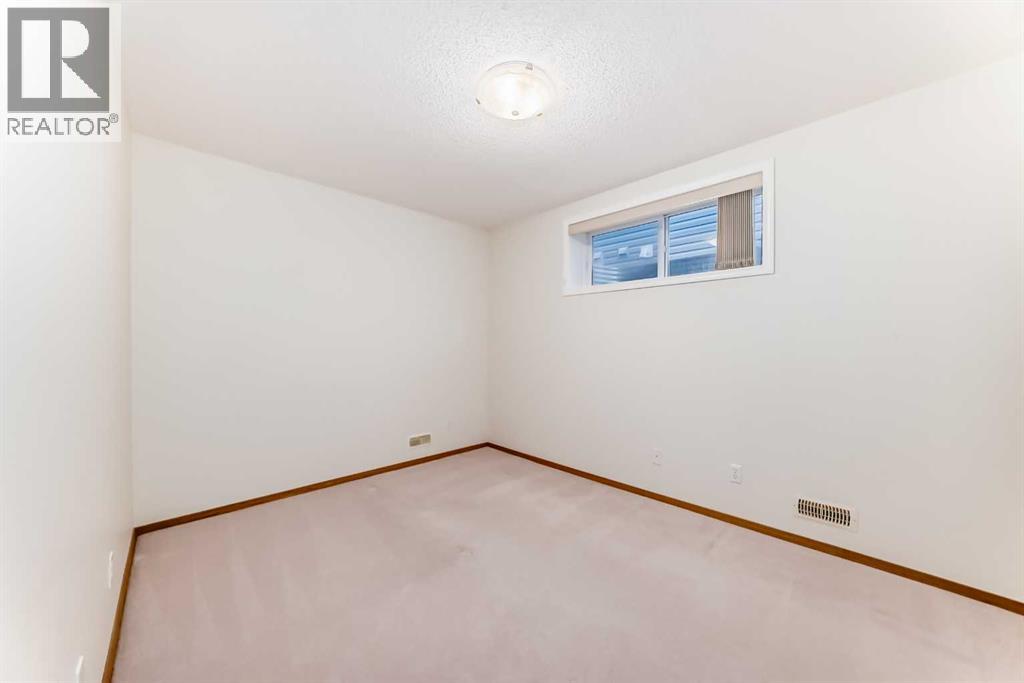 Single Family House Bungalow for Sale in  Cougartown Close SW Cougar Ridge Calgary 