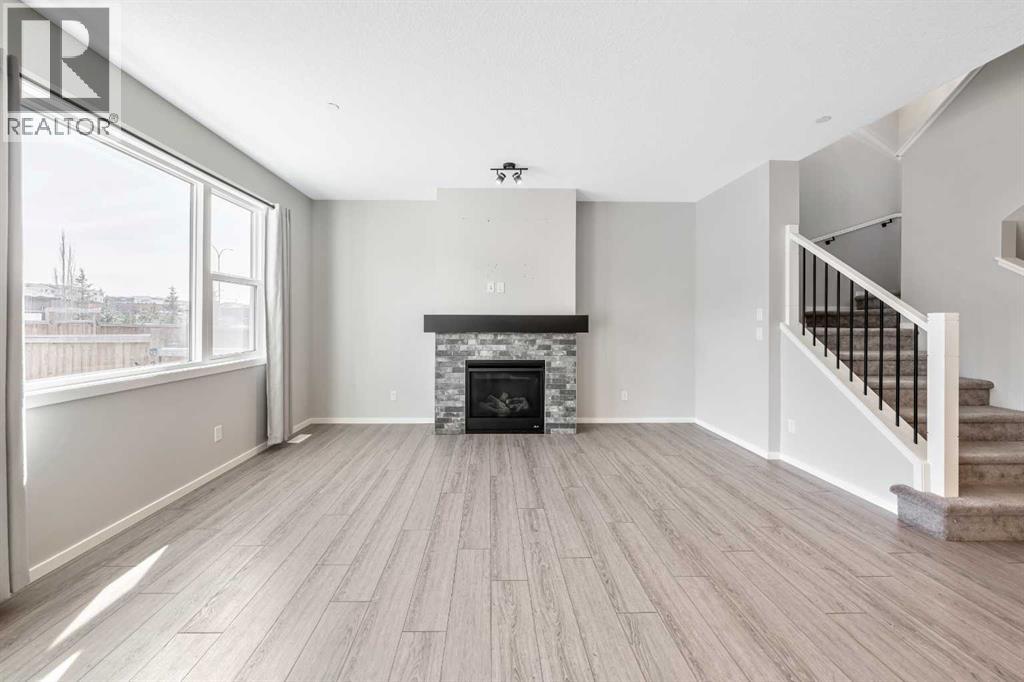 Single Family House for Sale in  Lucas Crescent NW Livingston Calgary 