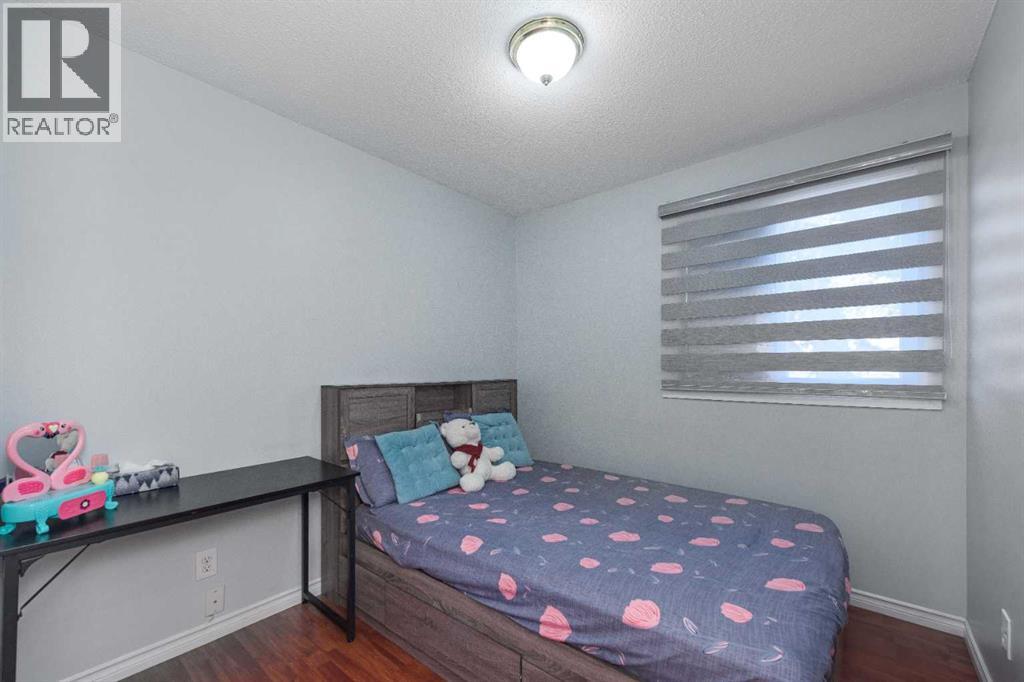 Single Family House Bi-level for Sale in  A Street SE Penbrooke Meadows Calgary 