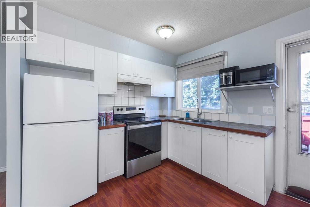 Single Family House Bi-level for Sale in  A Street SE Penbrooke Meadows Calgary 