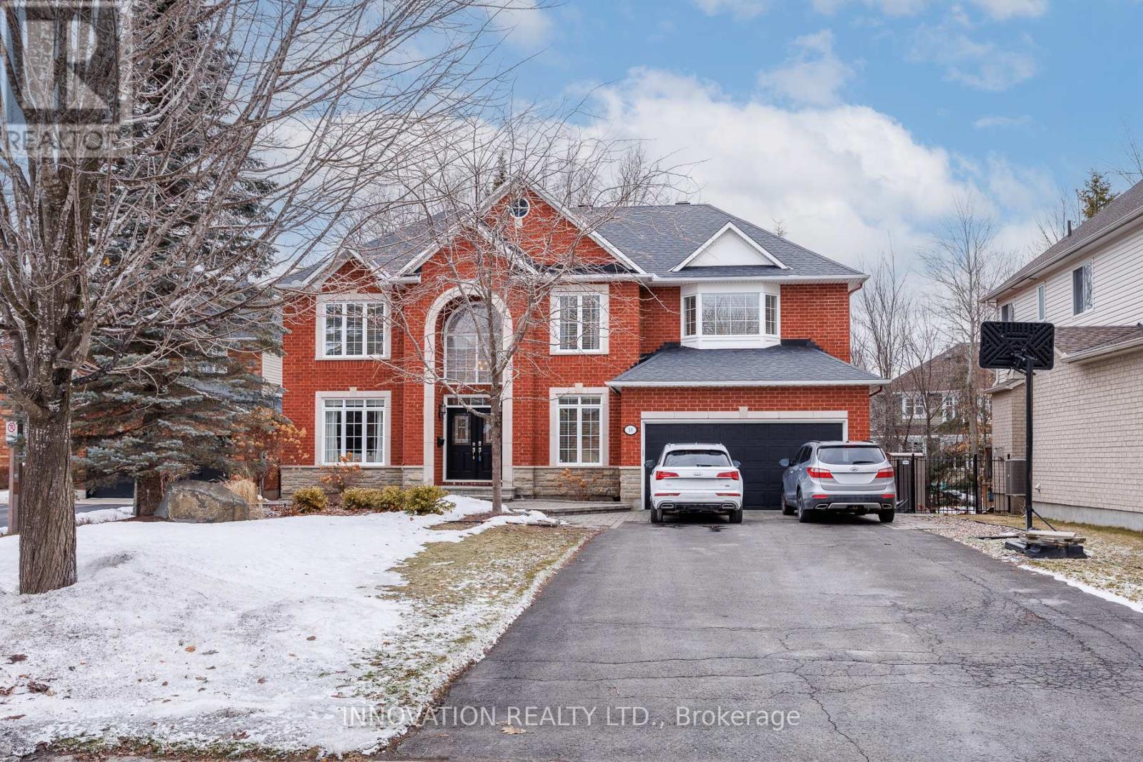 This 8 car driveway doubles as a basketball court